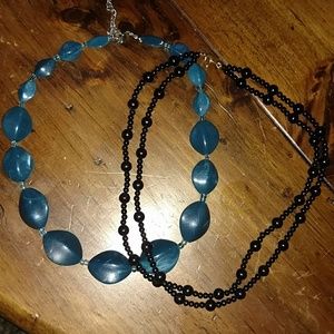 Bundle of two plastic bead necklaces